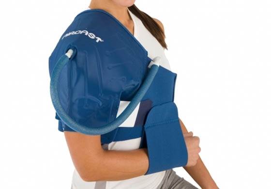 Close-up of young woman wearing an AIRCAST shoulder cryo/cuff on her shoulder