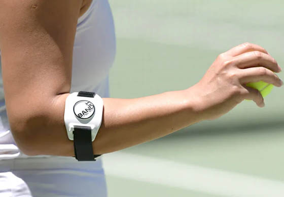 Close-up of woman playing tennis wearing a BandIt elbow brace